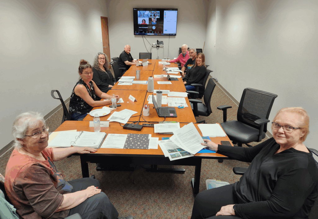 Board members and staff at our May 2025 hybrid meeting.